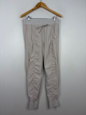 Athleta Attitude Pants Womens 10 Beige Light Stretch Workout Gym Travel Joggers